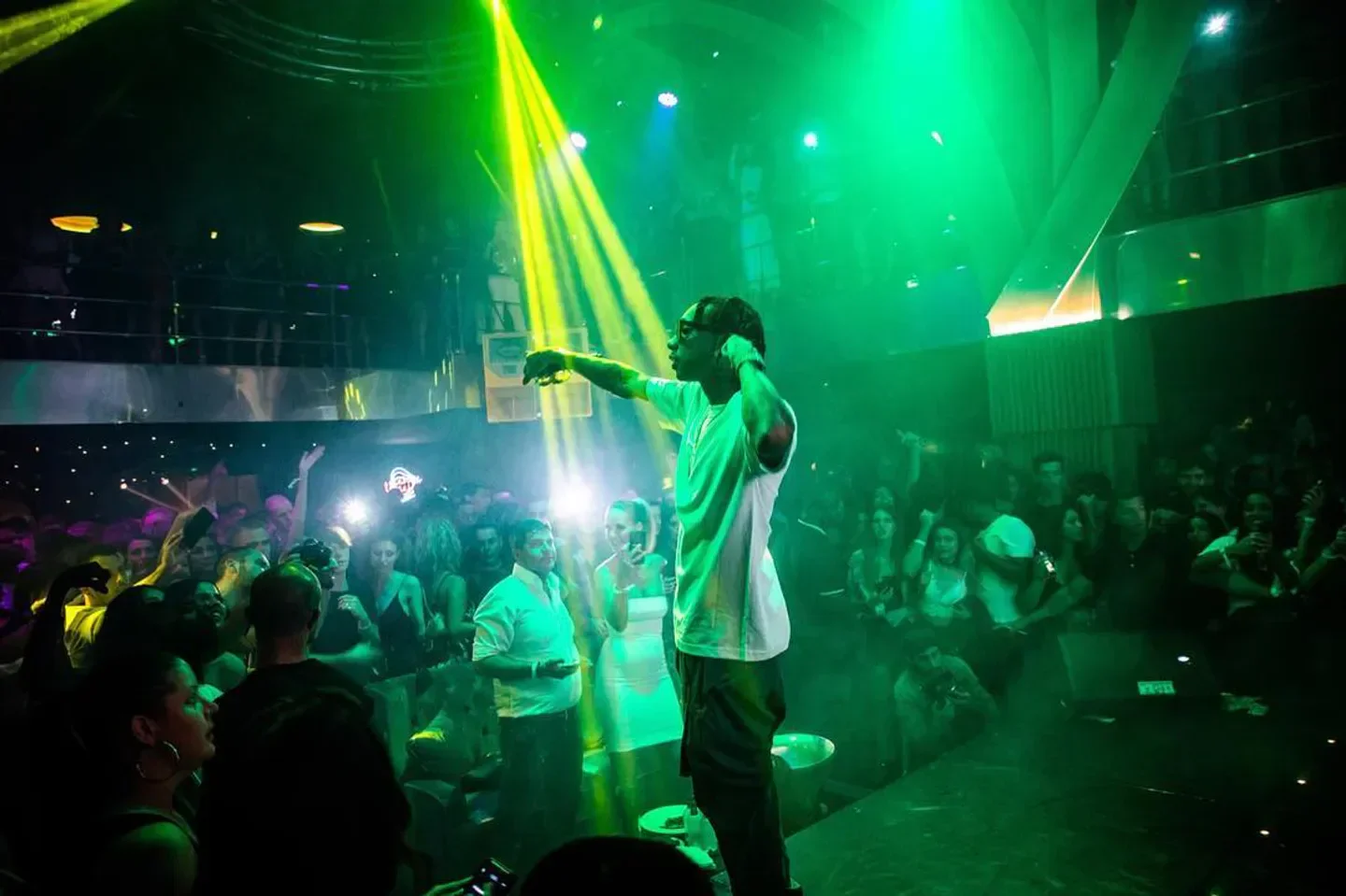 Energetic crowd at Dreamers nightclub in Marbella, lights and lively atmosphere.