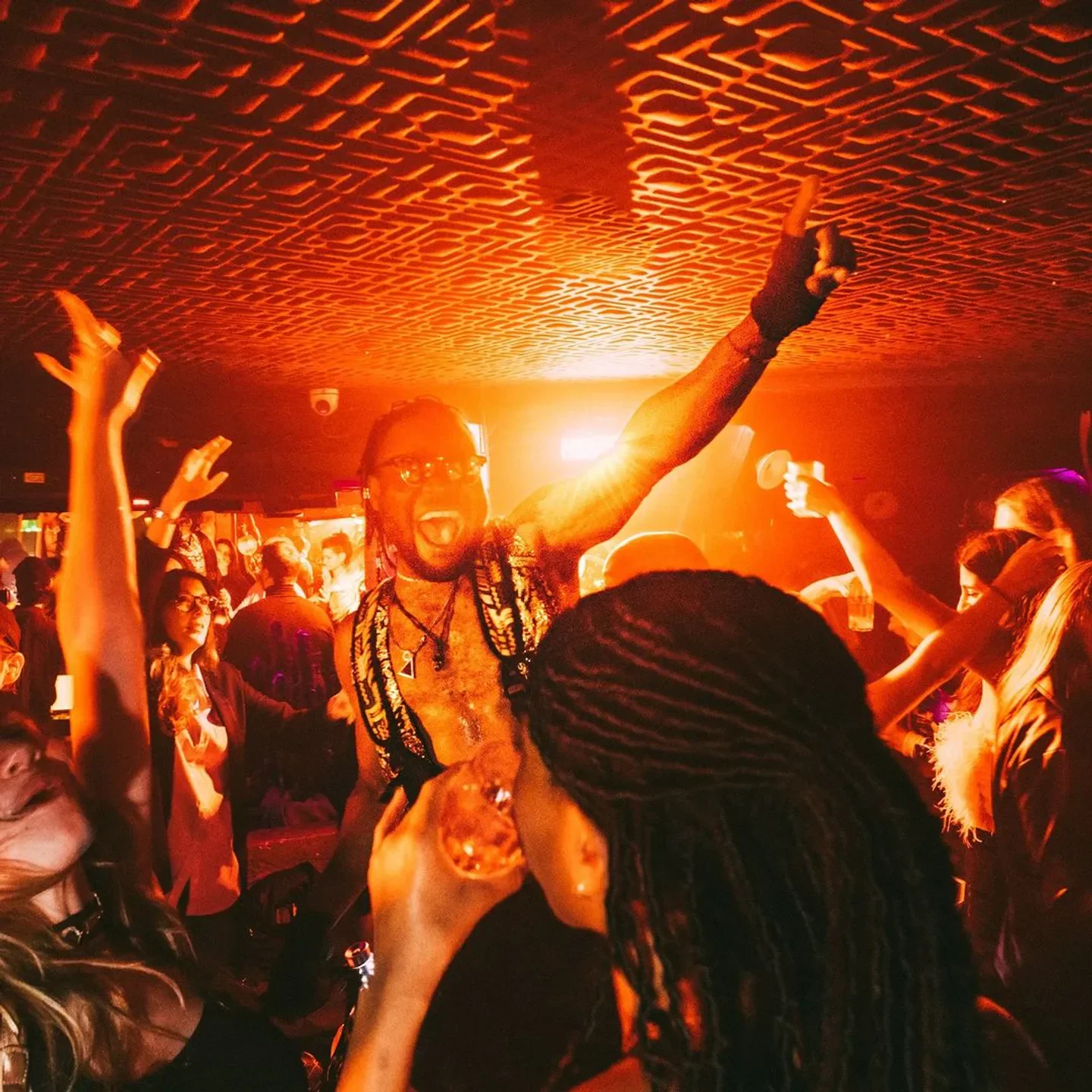 Energetic party at Kaktus Club in Paris, with people dancing and enjoying the nightlife.