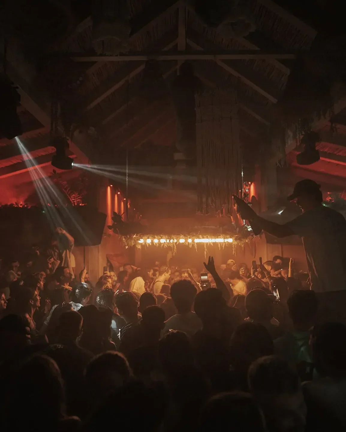 Energetic crowd at Playa Padre Beach Club in Marbella, enjoying the party atmosphere.