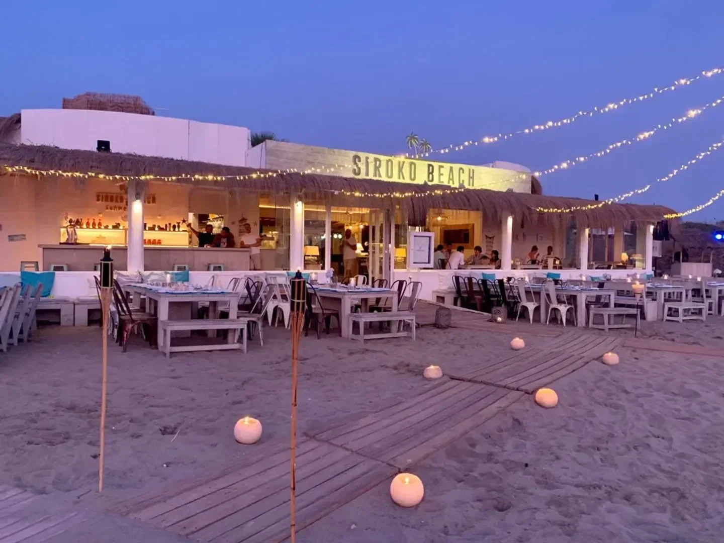 Siroko Beach restaurant in Marbella, with beachside tables and evening ambiance.